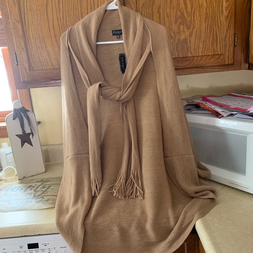 Women’s sweater poncho  with scarf.